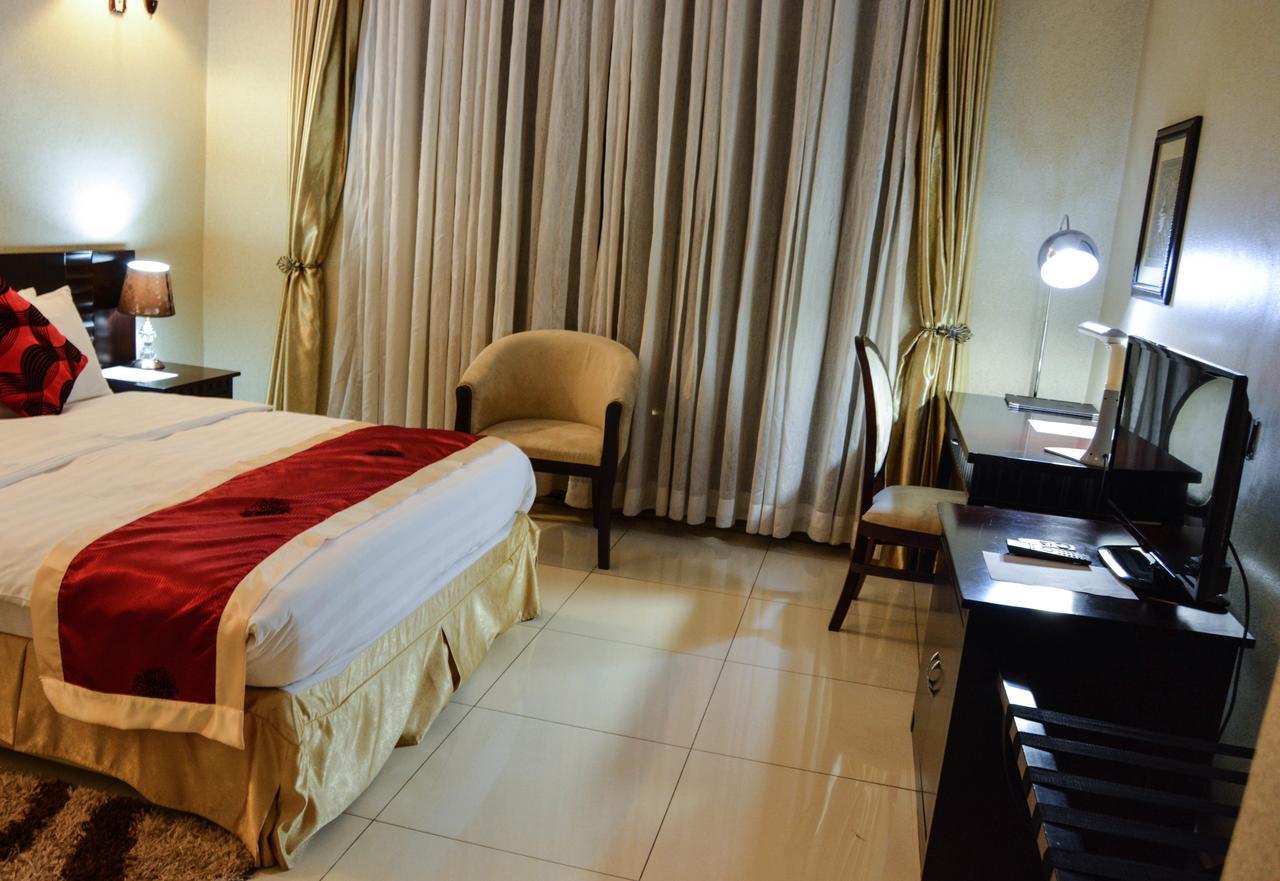 Elevate Suites Designated Transit Hotel Кигали Экстерьер фото